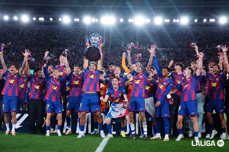 La Liga champions celebrate with the league trophy